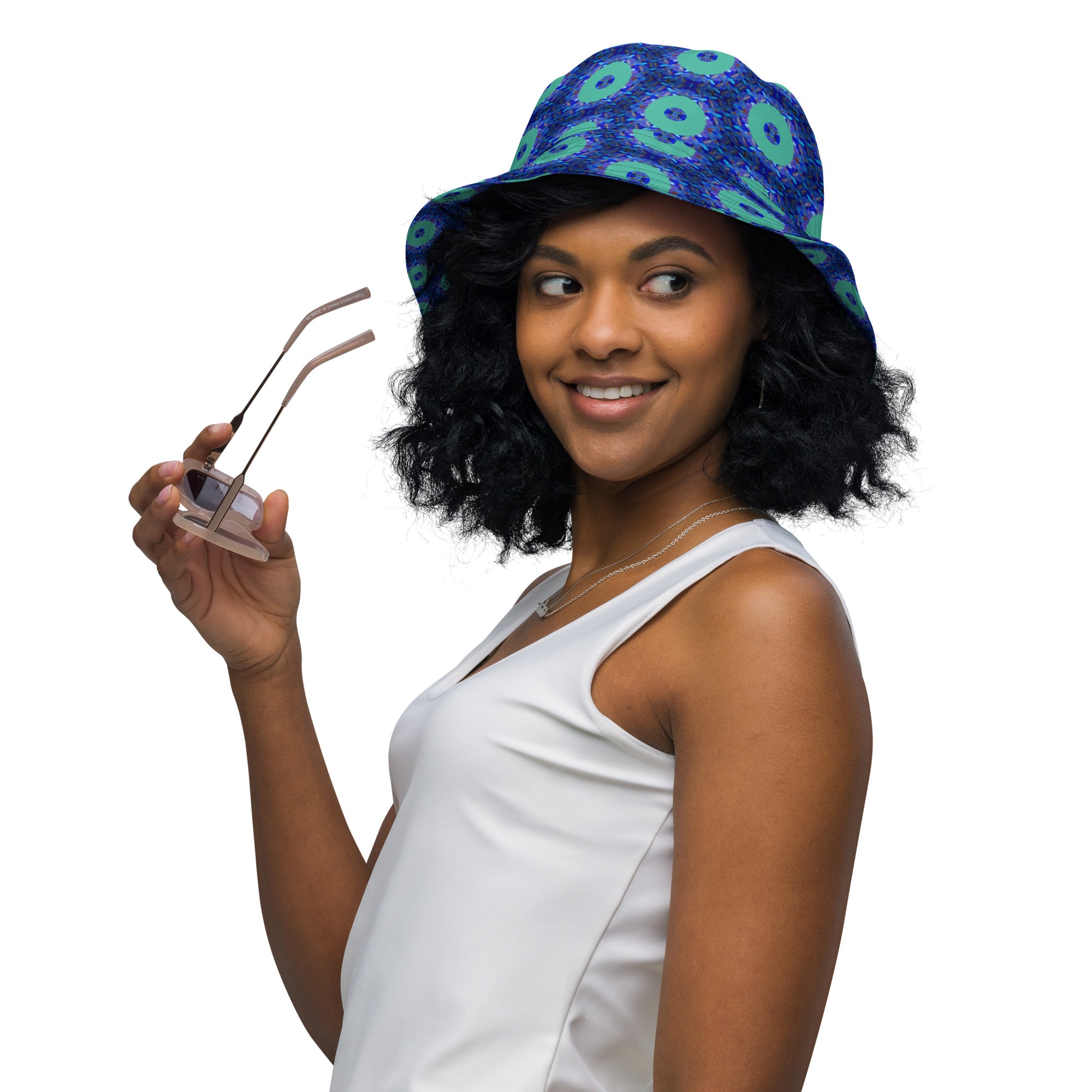 Model wearing the Savvy Munk Donut Remix - Reversible Bucket Hat, highlighting the bold graphic print and relaxed festival-ready fit in a lifestyle setting.