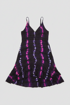 Savvy Munk Electric Orchid Tiered Maxi Dress featuring a black, blue, and hot pink tie-dye pattern on a tiered skirt and bodice with spaghetti straps.