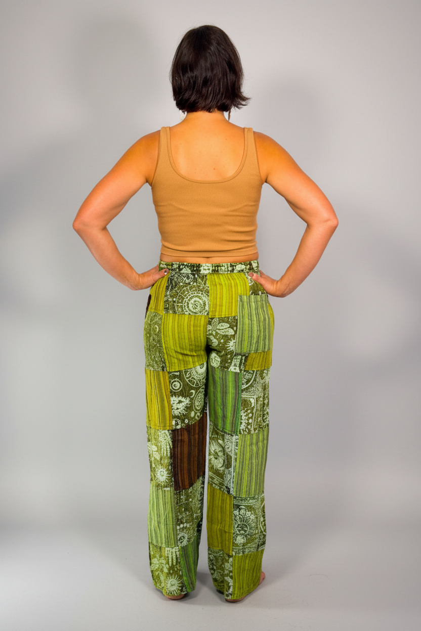 Savvy Munk model April wearing Sage sunburst patchwork pants. Rear view 