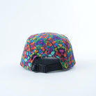 Savvy Munk Grass Water 5-Panel Hat displayed flat, highlighting the vibrant psychedelic print 