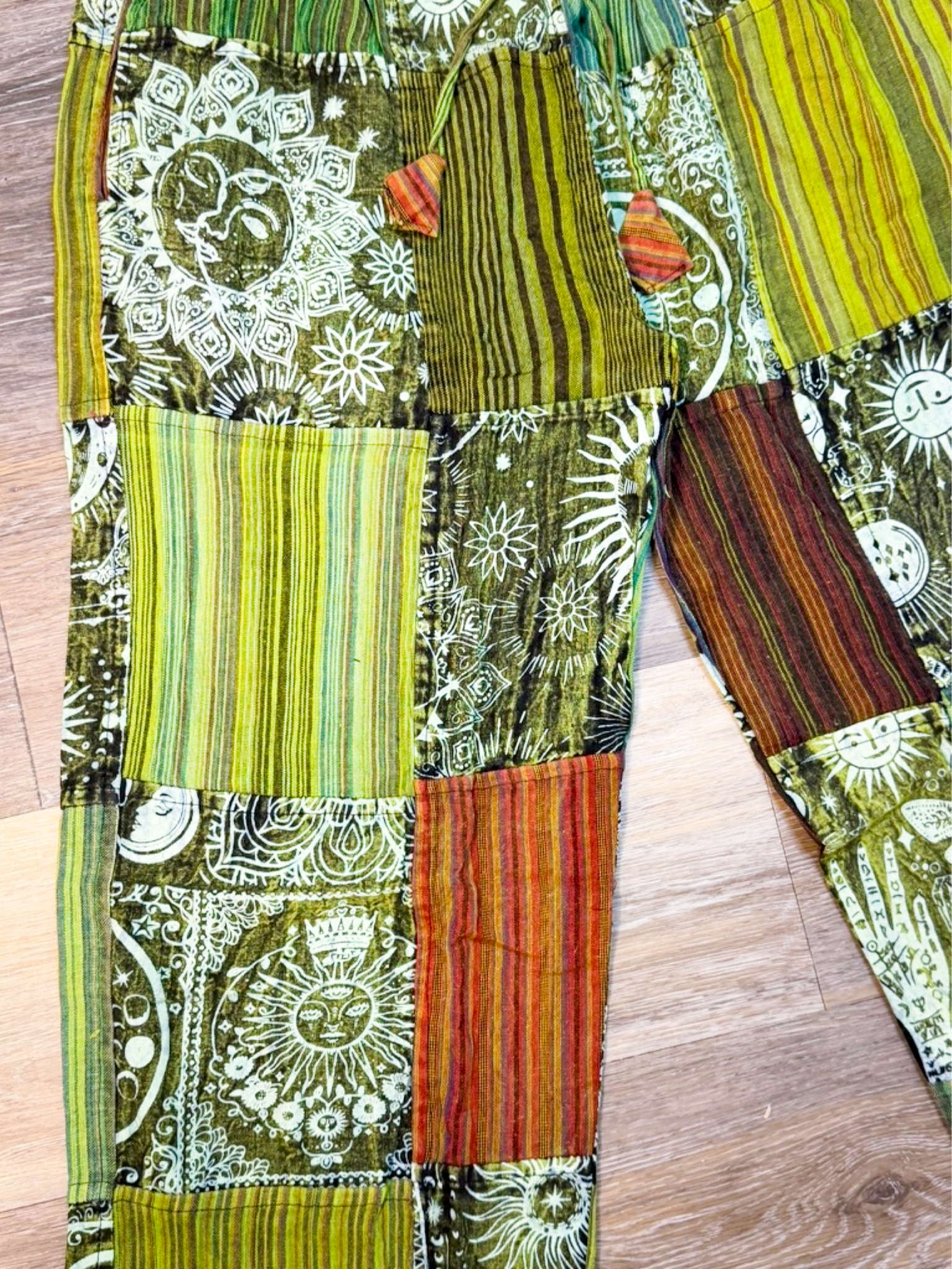 Savvy Munk
Sage Sunburst Patchwork Drawstring Pants close-up 