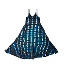 Savvy Munk Indigo Waves Hand-Dyed Tiered Maxi Dress displayed flat, highlighting vibrant handcrafted batik, tie-dye, and patchwork patterns on 100% artisan cotton from Nepal.