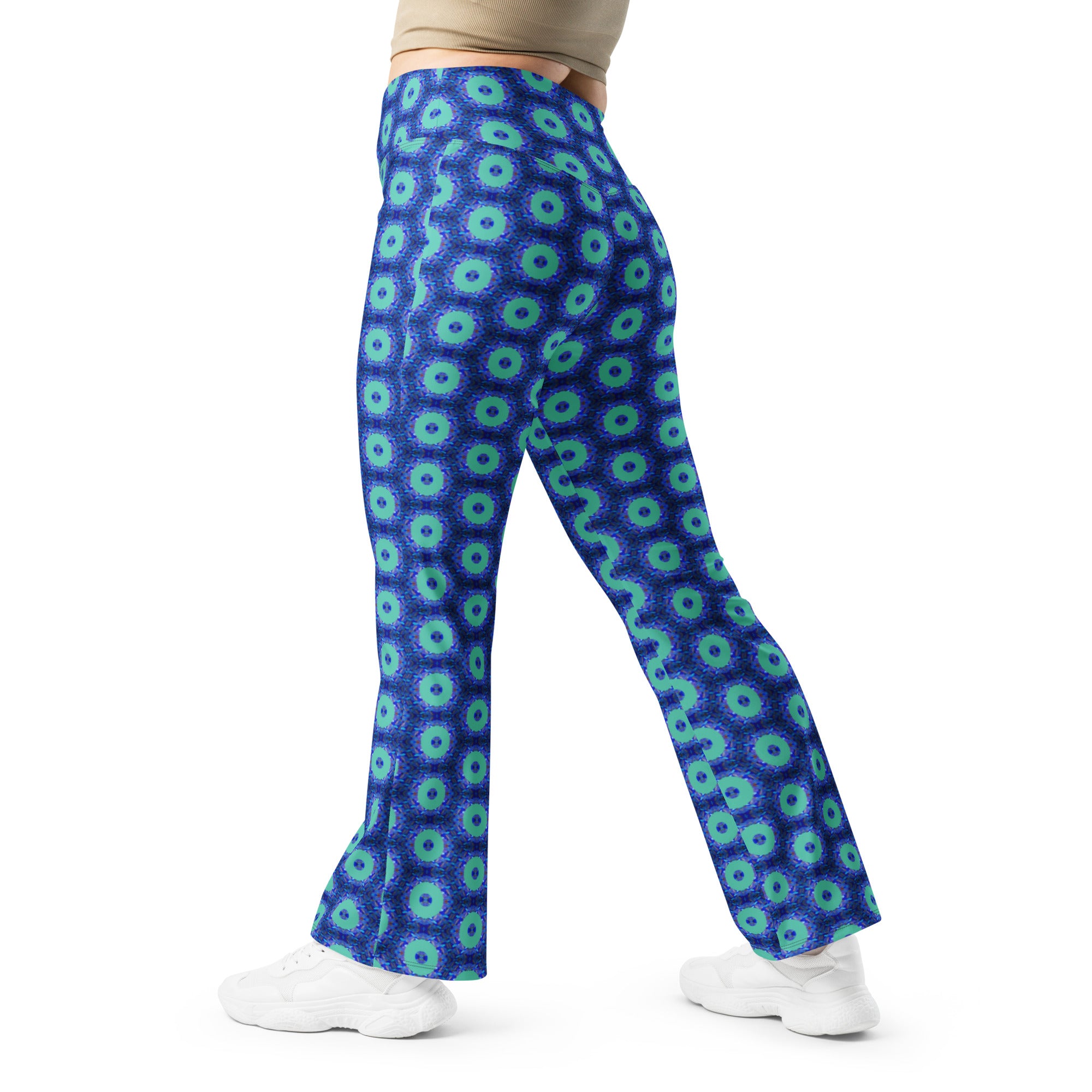 Model wearing the Savvy Munk Donut Remix - Flare Leggings, highlighting the bold graphic print and relaxed festival-ready fit in a lifestyle setting.