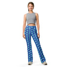 Model wearing the Savvy Munk Donut Remix - Flare Leggings, highlighting the bold graphic print and relaxed festival-ready fit in a lifestyle setting.
