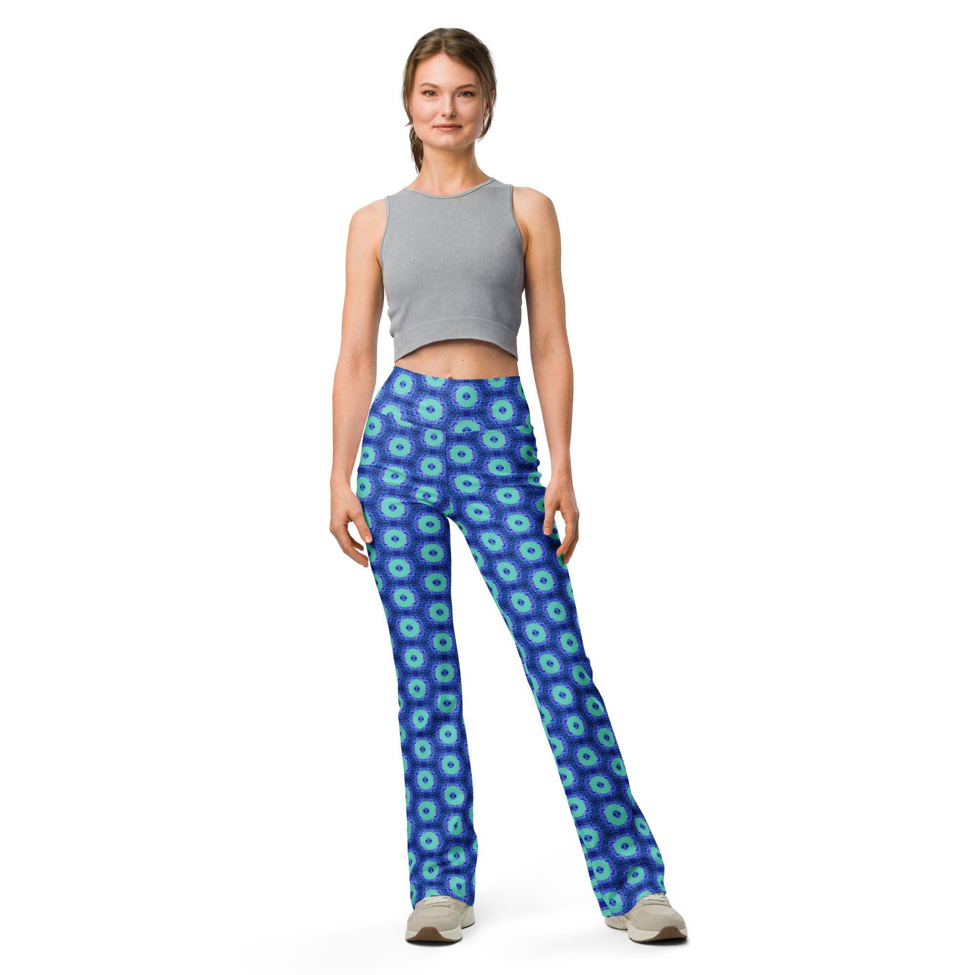 Model wearing the Savvy Munk Donut Remix - Flare Leggings, highlighting the bold graphic print and relaxed festival-ready fit in a lifestyle setting.