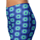Model wearing the Savvy Munk Donut Remix - Flare Leggings, highlighting the bold graphic print and relaxed festival-ready fit in a lifestyle setting.