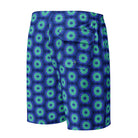 Model wearing the Savvy Munk Donut Remix - Men's Board Shorts, highlighting the bold graphic print and relaxed festival-ready fit in a lifestyle setting.