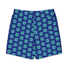 Model wearing the Savvy Munk Donut Remix - Men's Board Shorts, highlighting the bold graphic print and relaxed festival-ready fit in a lifestyle setting.