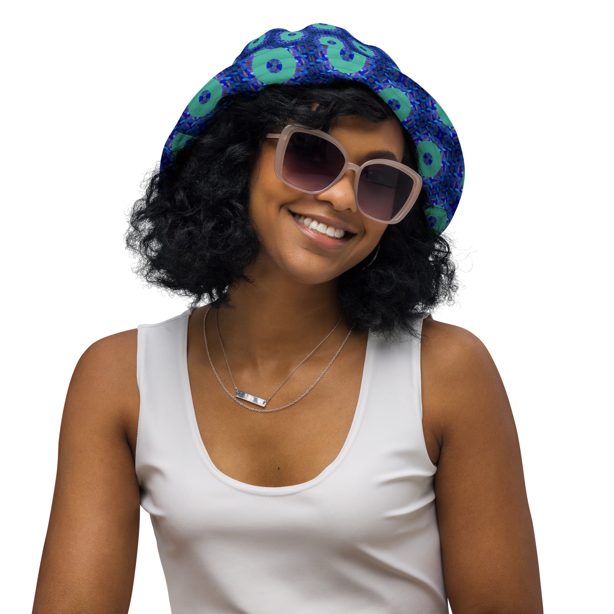 Model wearing the Savvy Munk Donut Remix - Reversible Bucket Hat, highlighting the bold graphic print and relaxed festival-ready fit in a lifestyle setting.